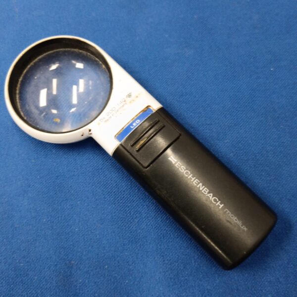 Eschenbach Mobilux LED magnifier for reading and detailed work.