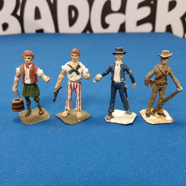 Four vintage lead cowboy & pirate figures