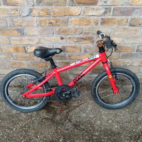 Red Frog bike for children, side view.