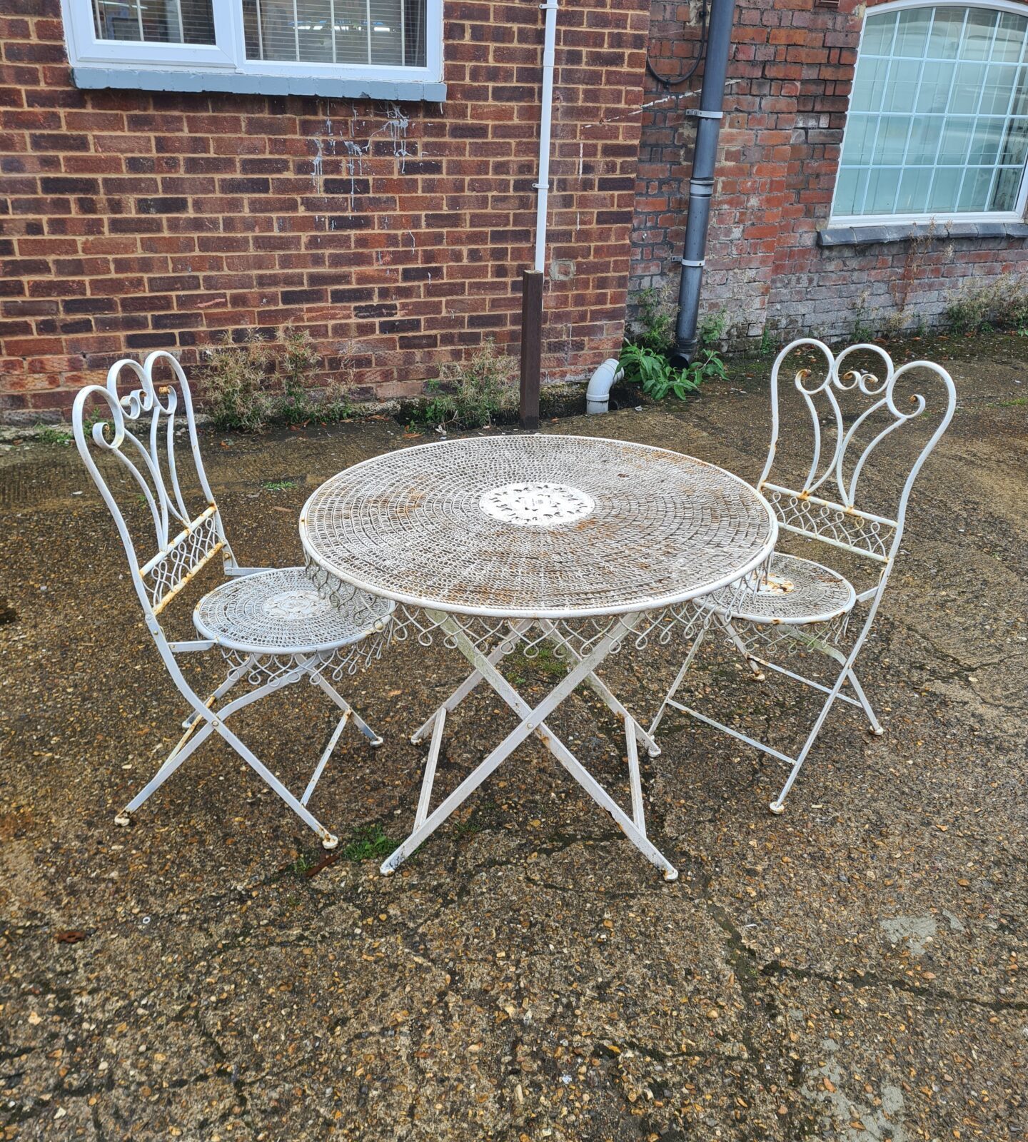 Wrought iron garden folding table and chairs