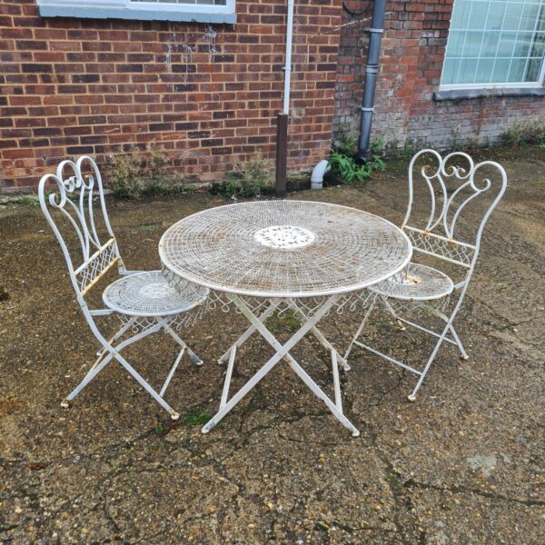 Wrought iron garden folding table and chairs