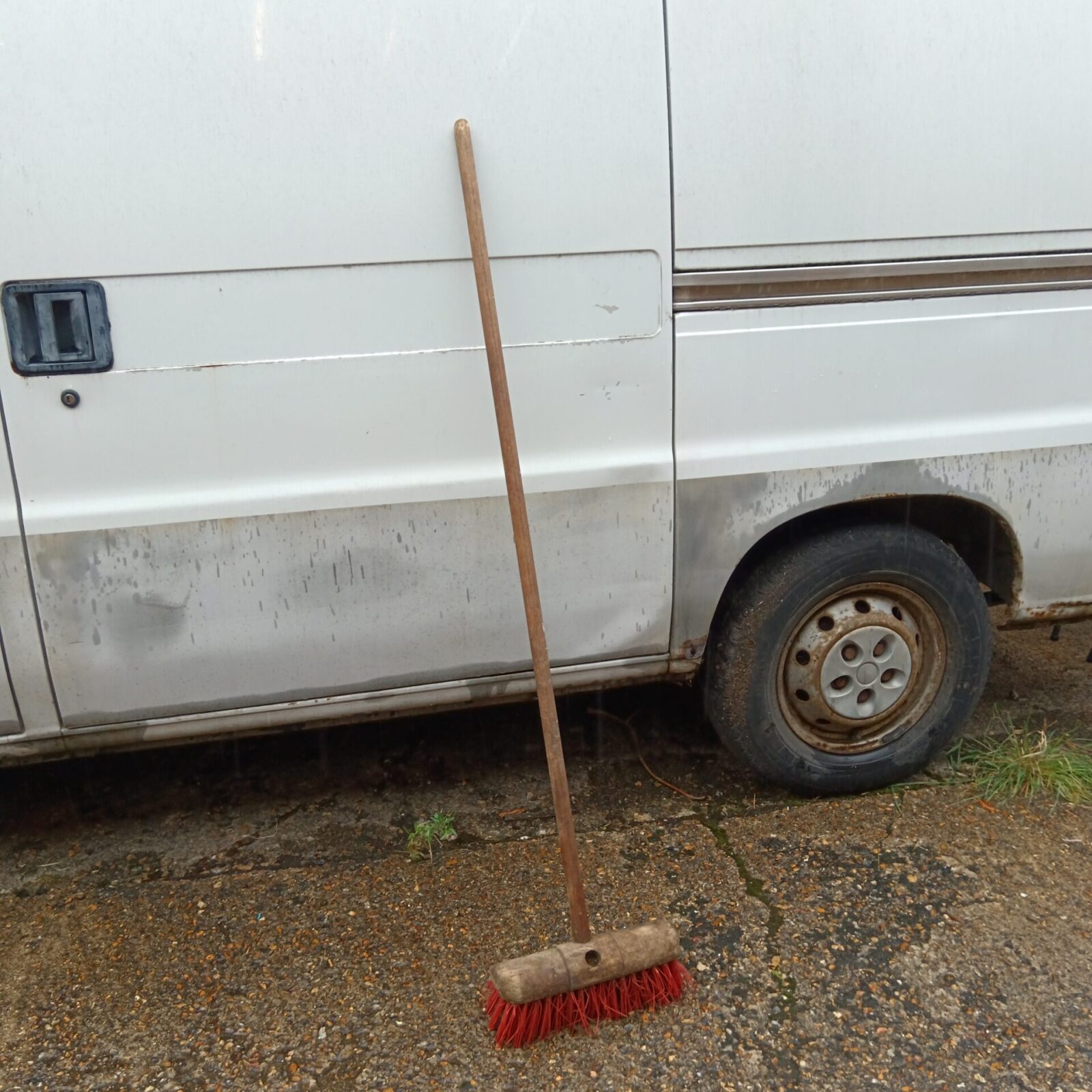 Large hard bristled yard broom