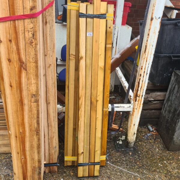 Three bundles of 4ft 6 inch timber ready for construction projects.