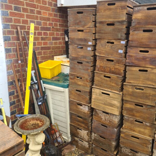 Lot of ten vintage wooden storage boxes with lids.
