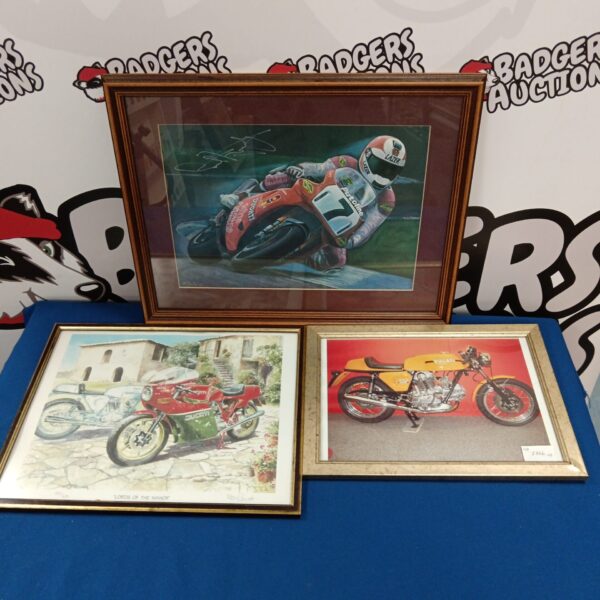 Three framed Ducati motorcycle prints one signed by Carl fogerty