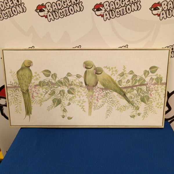 Framed canvas print of colourful parrots on a flowering vine.