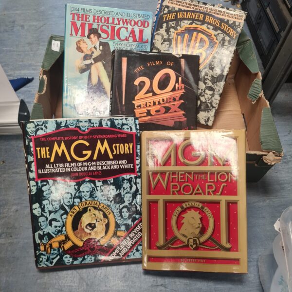 Lot of vintage movie studio history books, including MGM, Warner Bros, and 20th Century Fox.