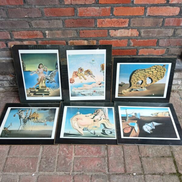Vintage collection of six Salvador Dali surreal prints for art collectors.