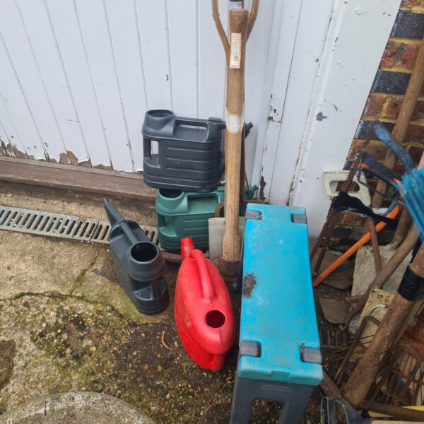 Bundle of garden tools and related items inc hozelocl bench and watering cans