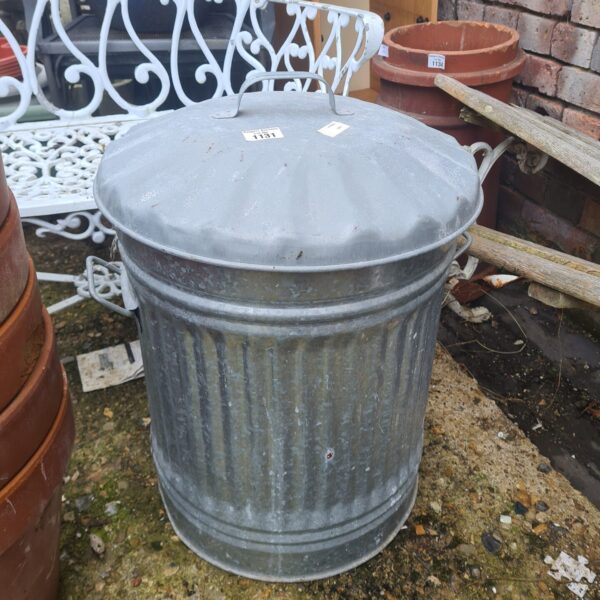 Vintage galvanised garden bin with rustic patina.
