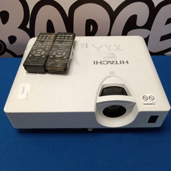 Hitachi CP-EX251N projector with remote control for presentations.