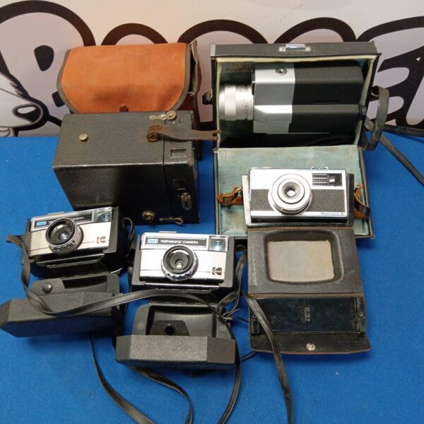 Vintage camera lot featuring a Zeiss Ikon and other antique film cameras.