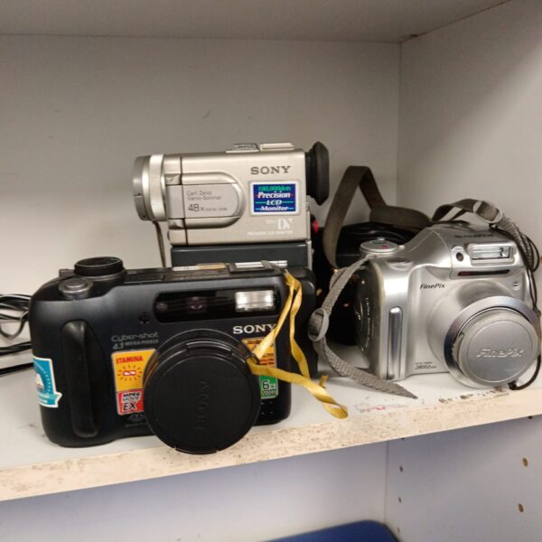 Three digital cameras including Sony dsc-s85 & dcr-pc10e
