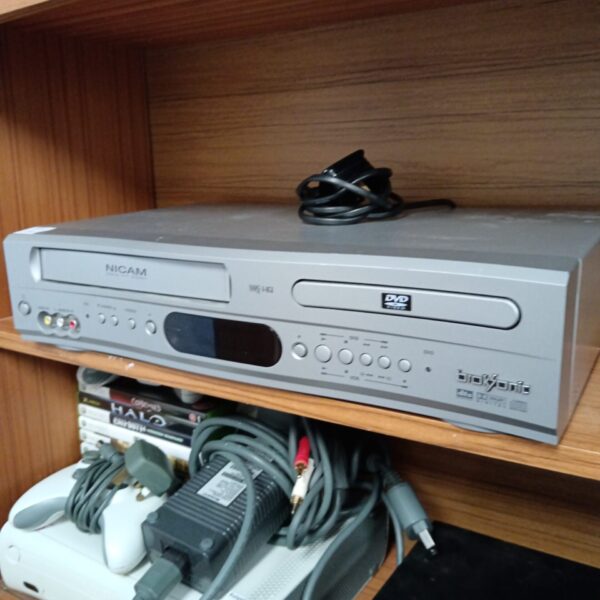 Silver BrokSonic DVCR-810 DVD player with front controls visible.