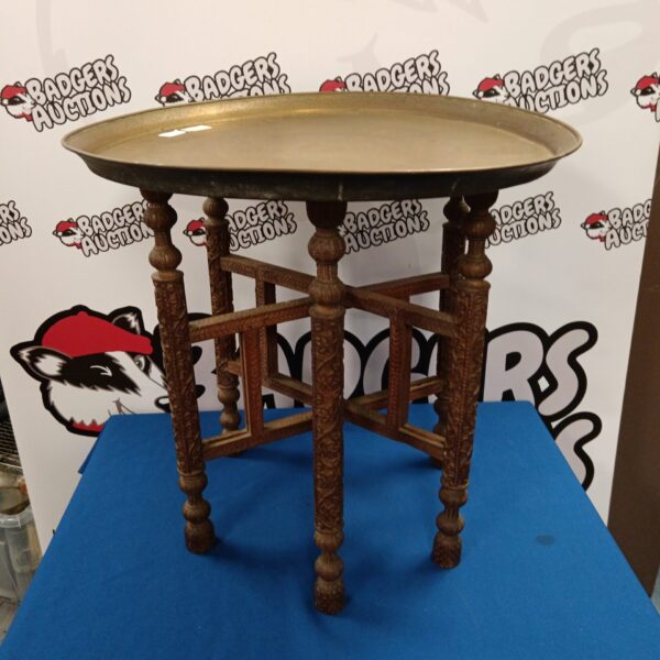 Vintage engraved brass charger topped Egyptian folding table