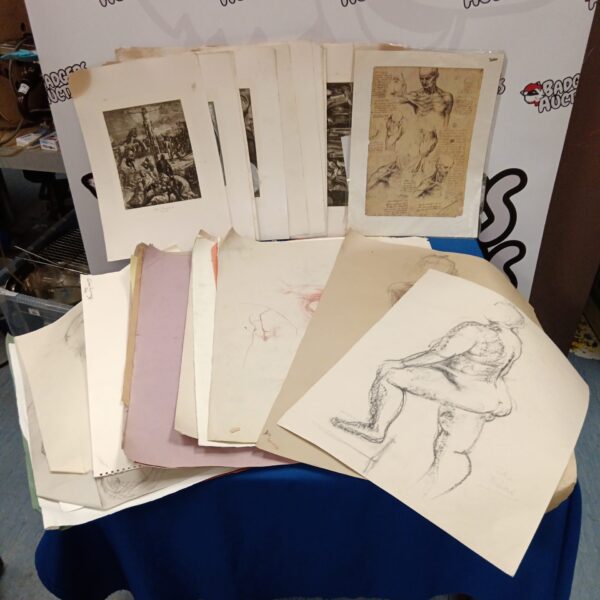 Collection of vintage nude figure sketches and classical prints.