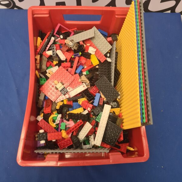 Mixed lot of colourful Lego compatible building bricks for creative play.