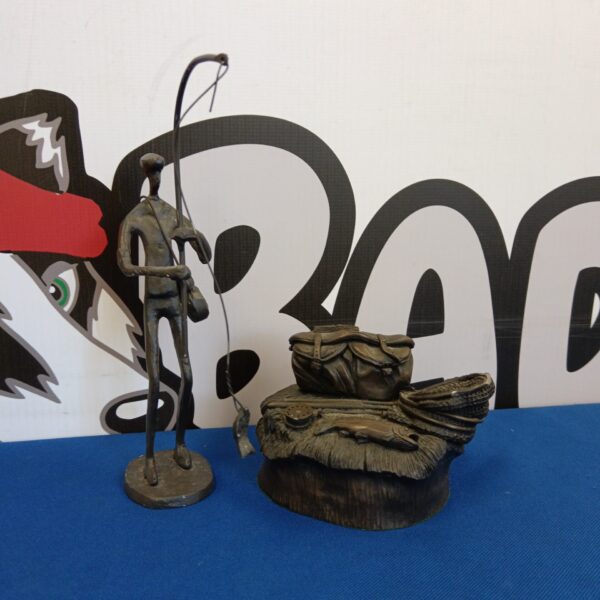 Pair of vintage metal fishing sculptures with weathered patina.
