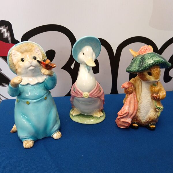 Charming Beatrix Potter Peter Rabbit moneybox by Enesco.