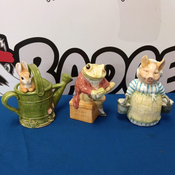 Charming Peter Rabbit moneybox by Enesco, a Beatrix Potter collectible.