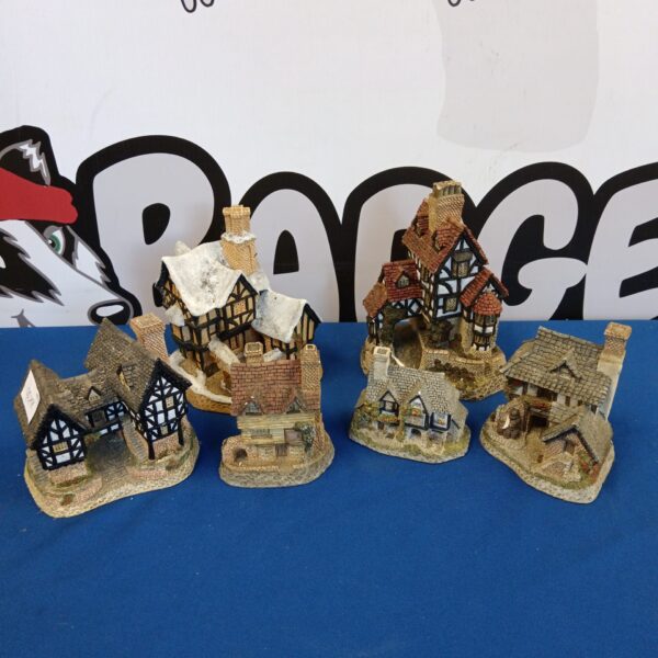 Detailed David Winter cottage collection for collectors and display.