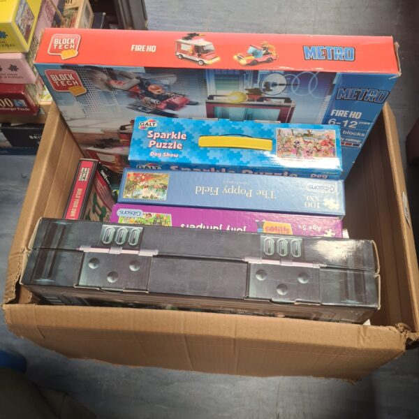 Box of mixed games and puzzles
