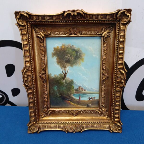 Vintage continental lake scene painting on brass with mountains.