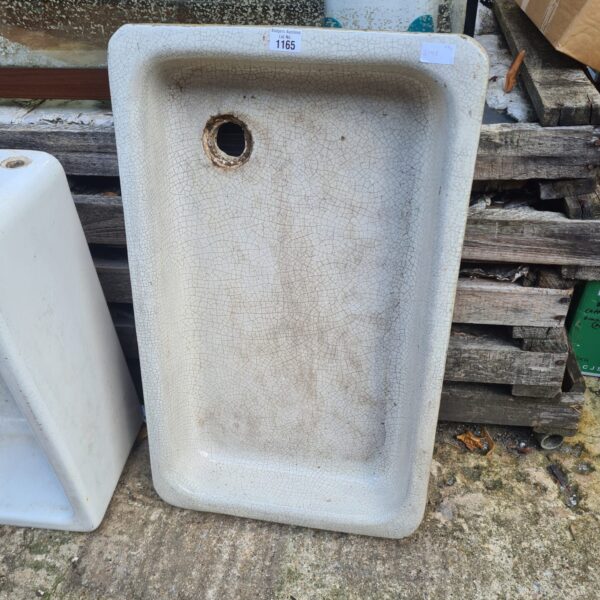 Vintage stone glazed sink with crazed enamel finish.