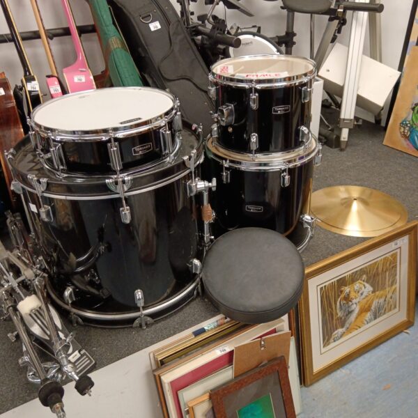 Black Tornado drum kit with cymbals and drum stool.