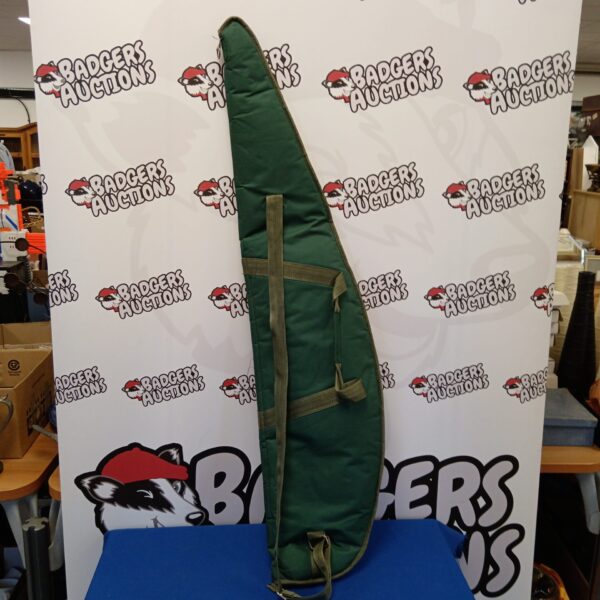 Green padded rifle case for secure firearm storage and transport.