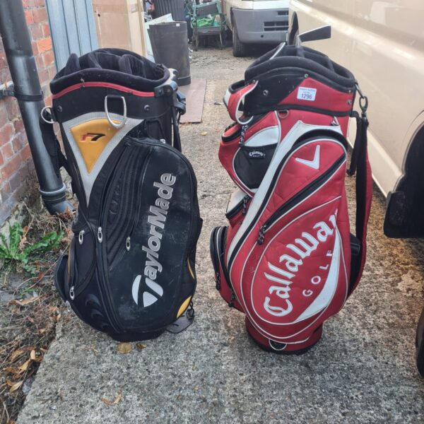 Two used golf bags, a Callaway and a Taylormade, for sale.
