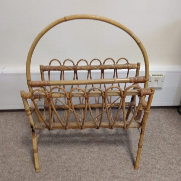 Vintage bamboo magazine rack for stylish storage.