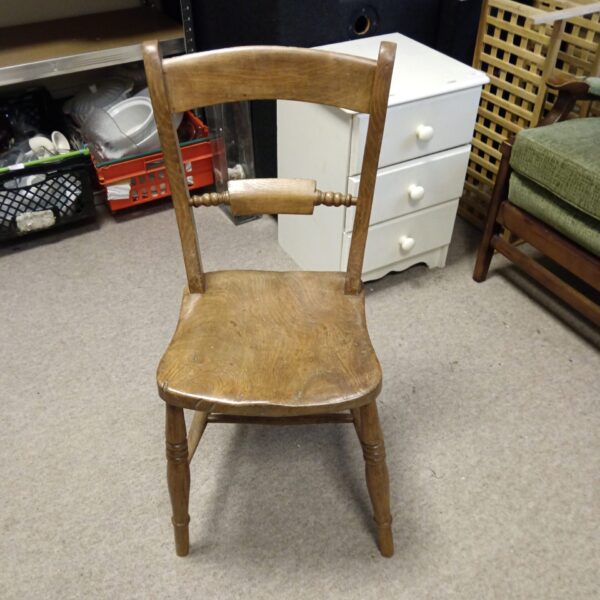 Antique 19th-century Oxford scroll back chair with a sculpted back.