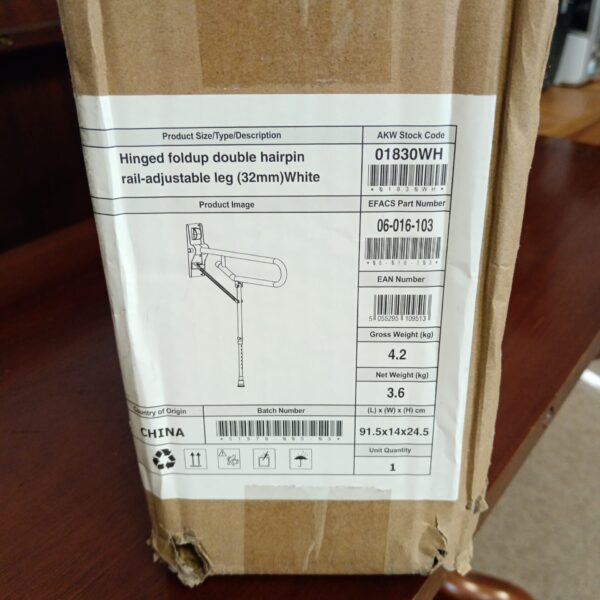 AKW hinged handrail with adjustable leg for bathroom accessibility.