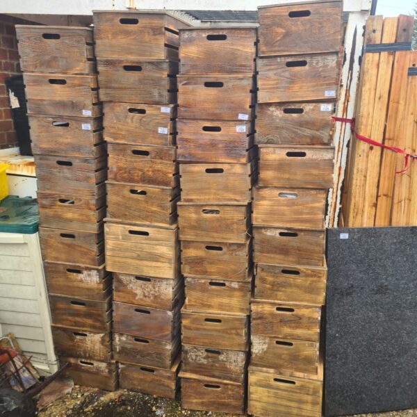 Lot of ten vintage wooden storage boxes with lids.