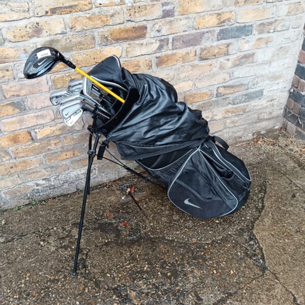 Set of Nike golf clubs in bag