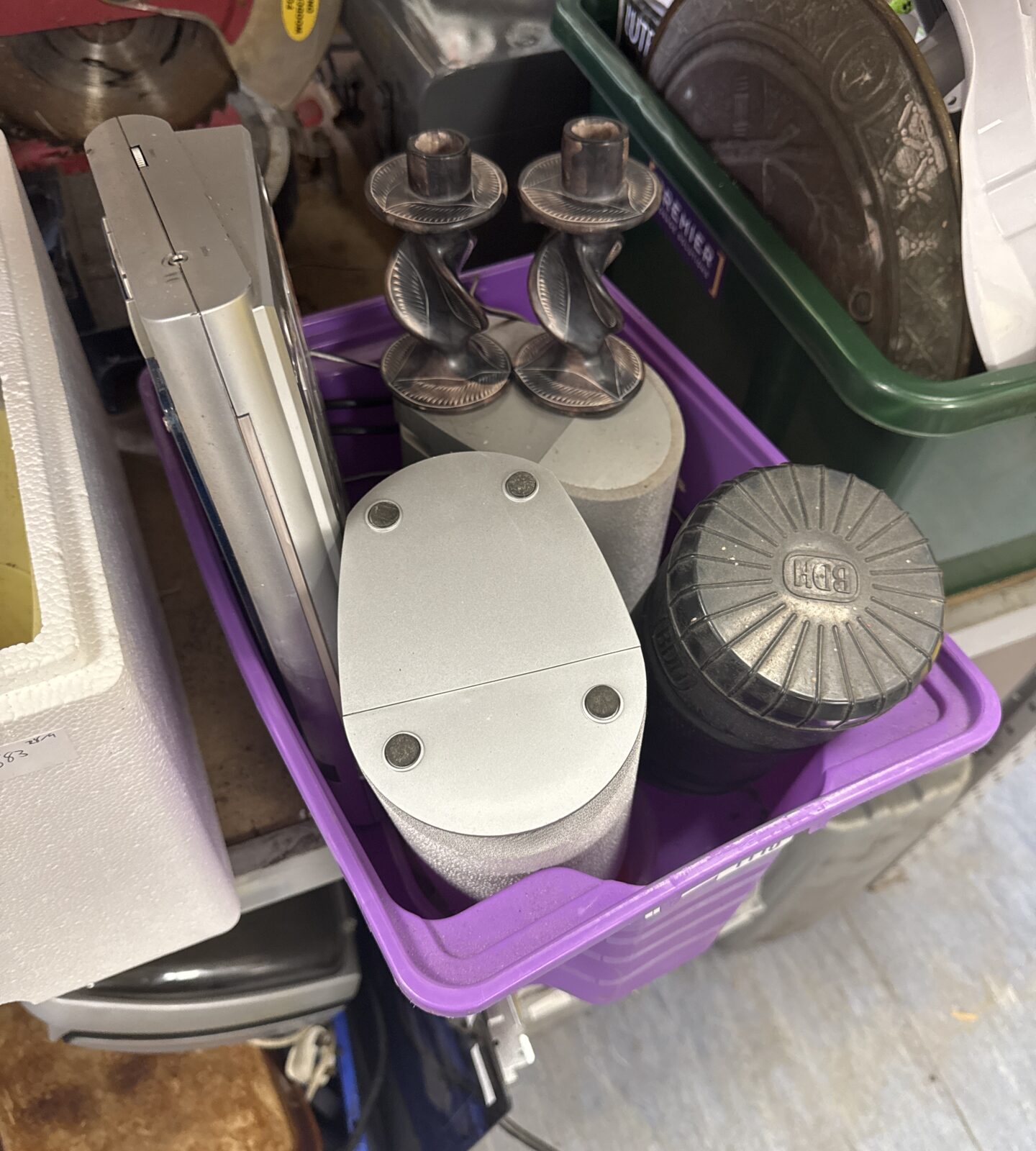 Vintage Bush portable CD player in a box of items.
