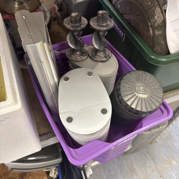 Vintage Bush portable CD player in a box of items.