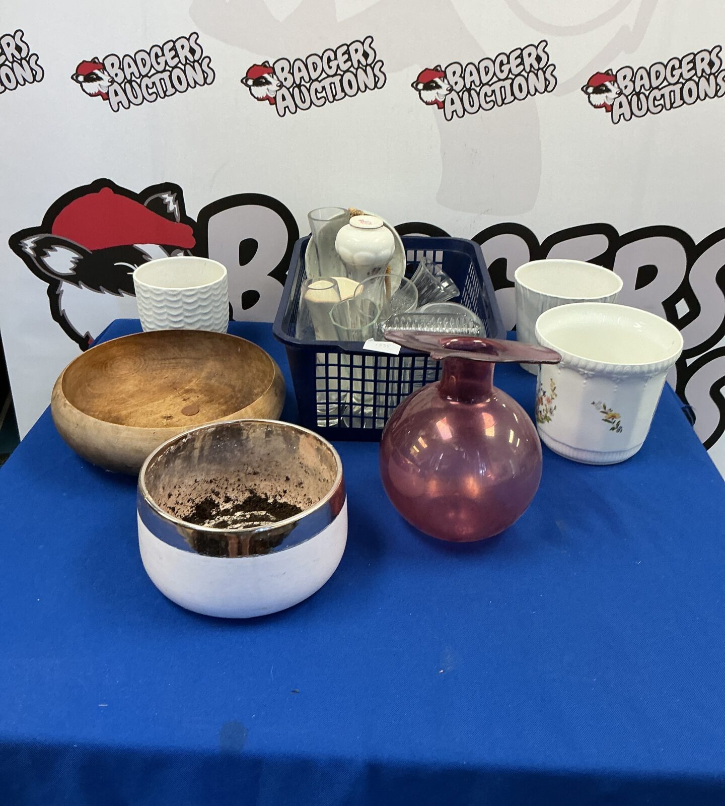 Assorted ceramic flower pots and vases for home decor.