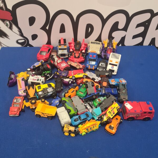 Large lot of mixed diecast toy cars and vehicles.