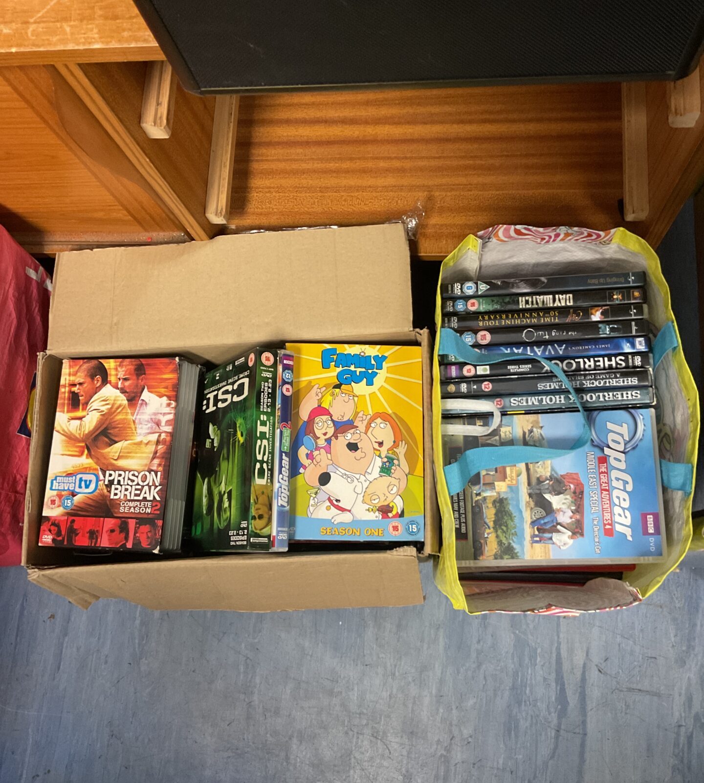 DVD box sets including Family Guy, Prison Break, and 24.