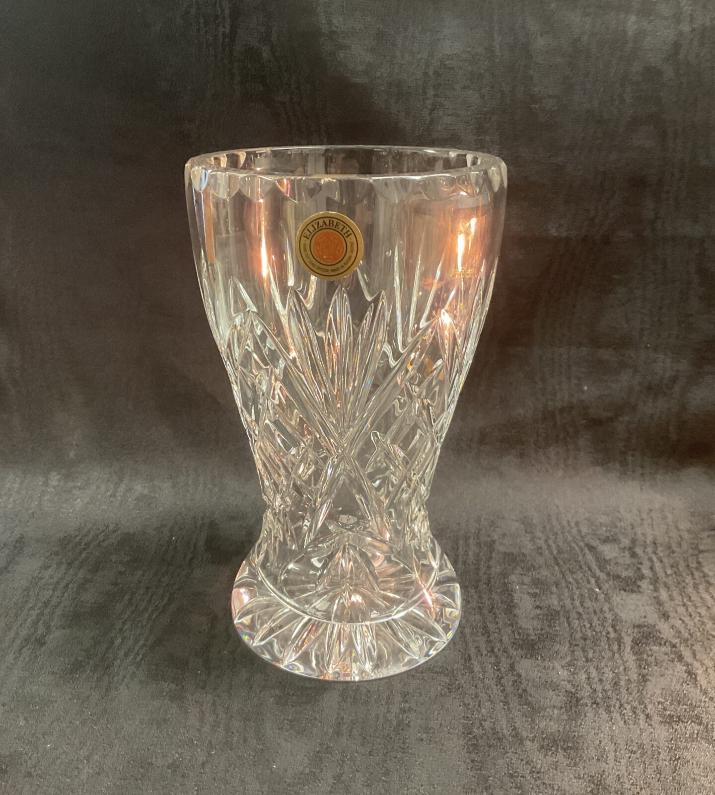 Stunning Elizabeth hand-cut crystal vase with starburst pattern.