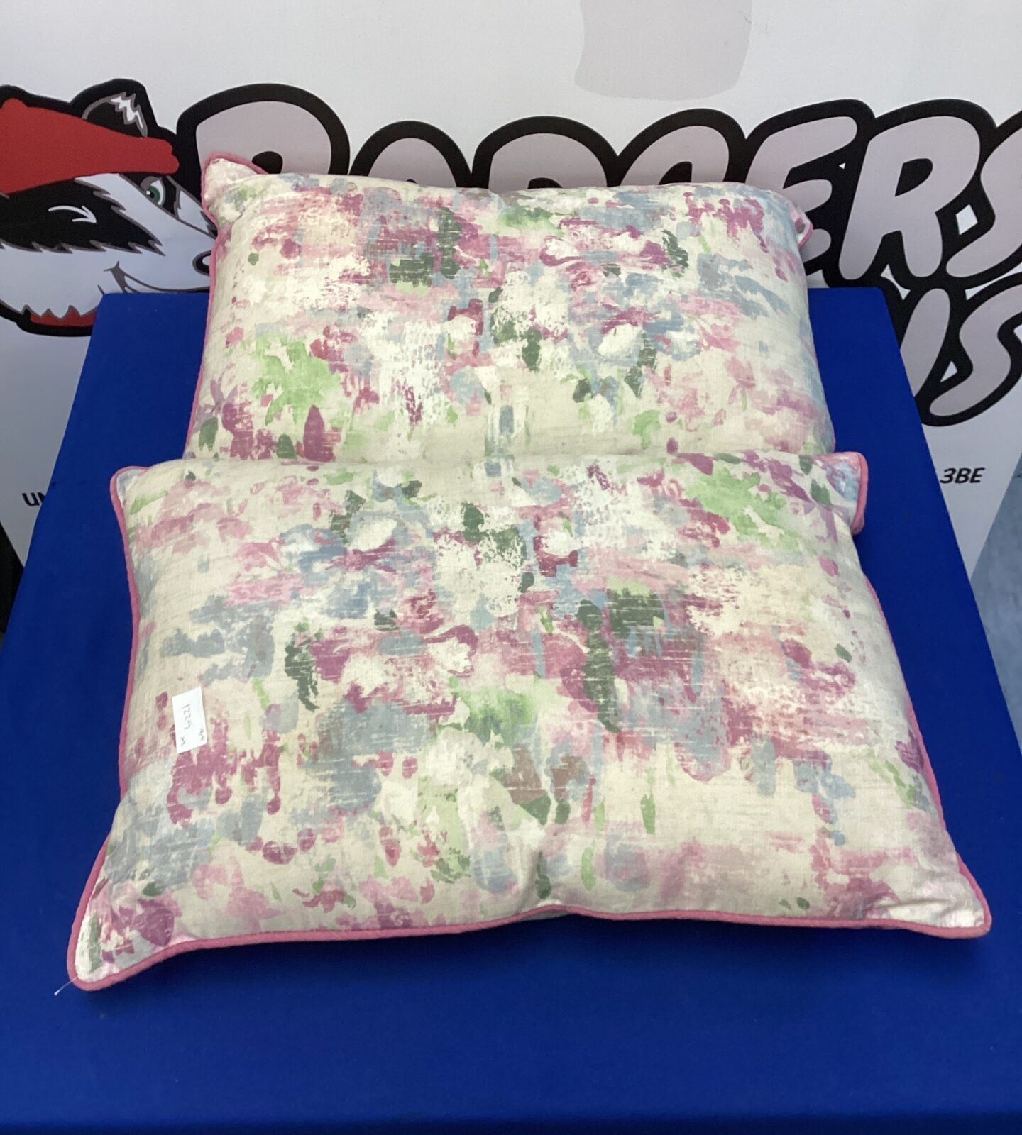 Vibrant floral patterned cushion for home decor.