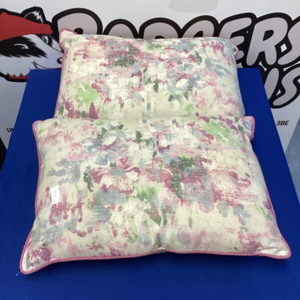 Vibrant floral patterned cushion for home decor.