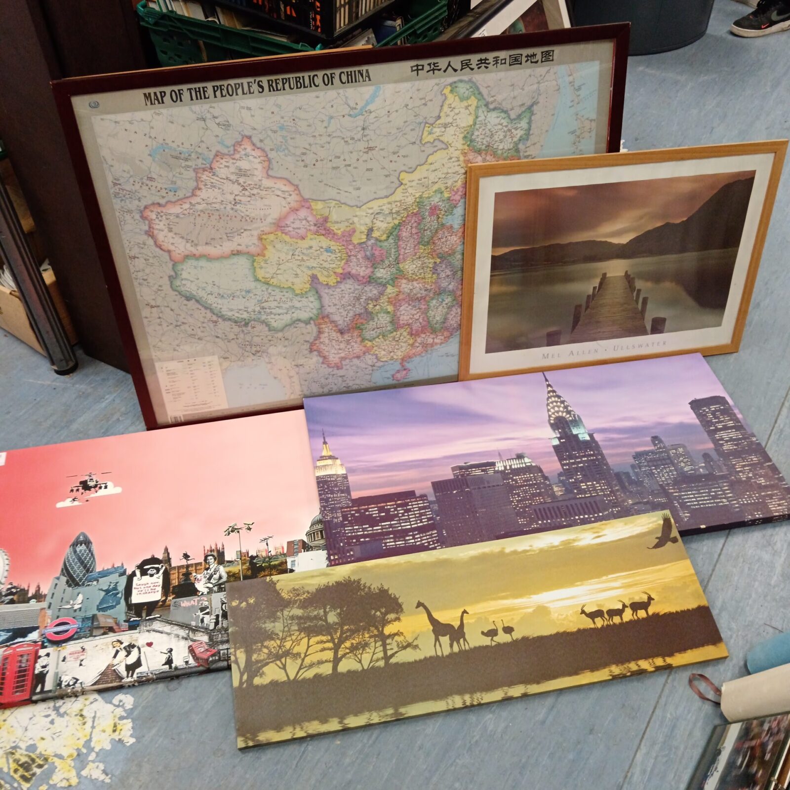 Selection of framed art prints and canvas featuring a map of China.