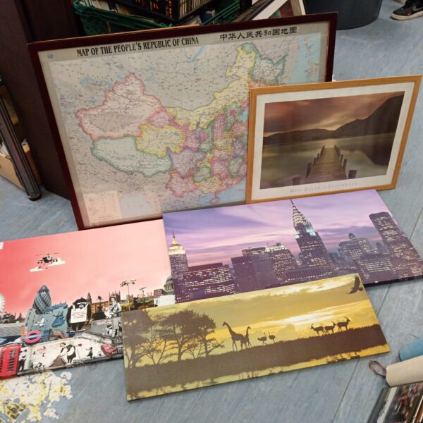 Selection of framed art prints and canvas featuring a map of China.