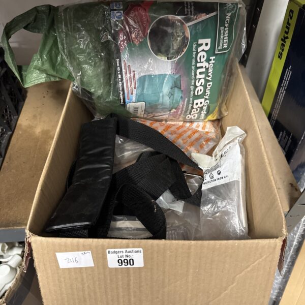 Garden clearance lot with heavy duty bag and safety goggles.