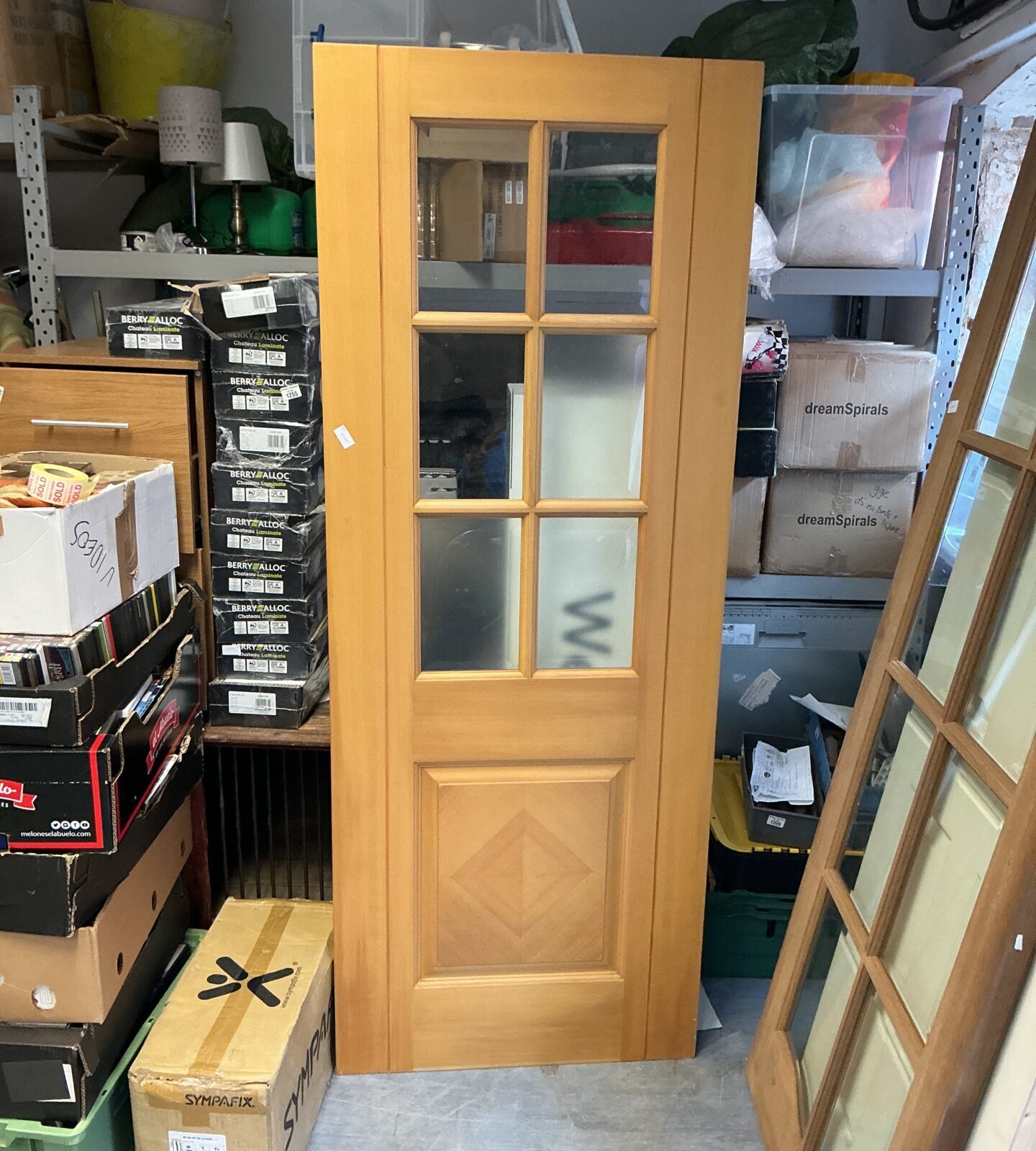 Salvaged half glass door measuring 78x30, ideal for interior use.