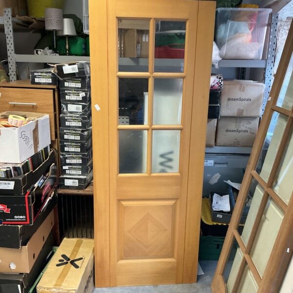 Salvaged half glass door measuring 78x30, ideal for interior use.