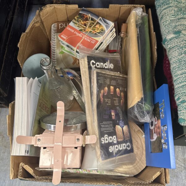 Mixed house clearance lot with vintage magazines and wooden stand.